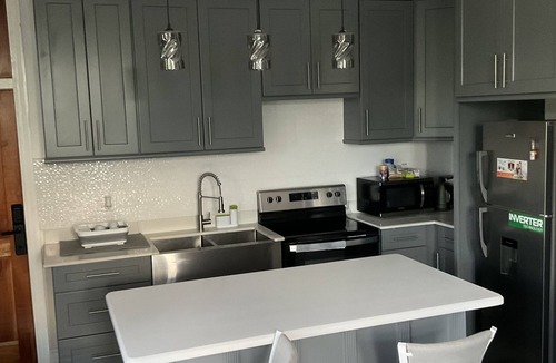 Camperdown Condo | Secure 2BR 2.5BA Condo with Balcony & Pool in Gated Kingston Complex