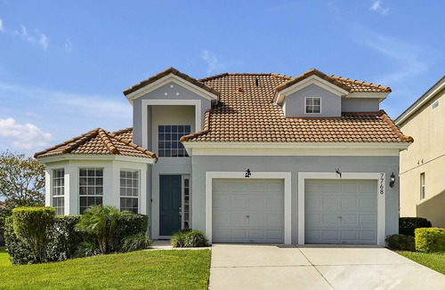 Windsor Hills Villa | Southwest facing pool - loads of green space!