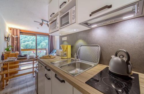 Le Corbier Apartment | Studio Soyouz Vanguard-63 by Interhome