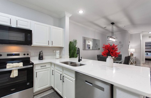 Four Corners Condo | Stylish 3BR Condo in Tuscana Resort | Pool, Balcony & Prime Location!