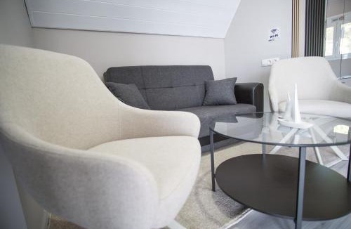 Isthmia Apartment | Sunny Home Loutraki is a modern studio with views of the bay and mountains with private parking