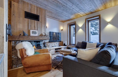 Val-d'Isere Apartment | Superbe duplex 68m² avec cheminée, 2 chambres, parking intérieur, et services inclus à Val d'Isère - FR-1-567-46
