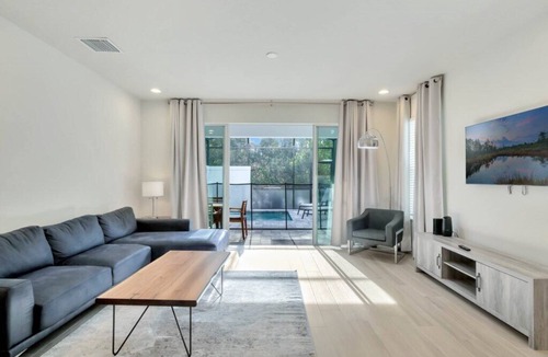 Woodridge House | TR17226 – Stylish 4-Bedroom home with Private Pool & Club Access near Disney