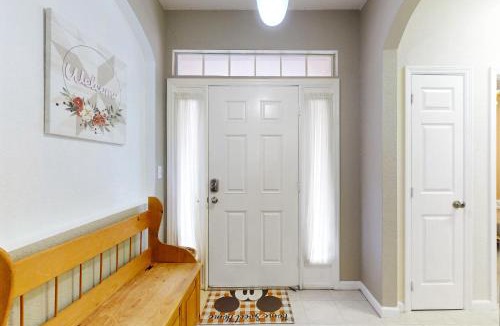 Trafalgar Village House | Updated retreat with pool access, W/D, AC, & patio - close to Disney Parks