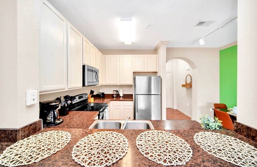 West Kissimmee Condo | Upstay - Condo w Pool - Near Disney!