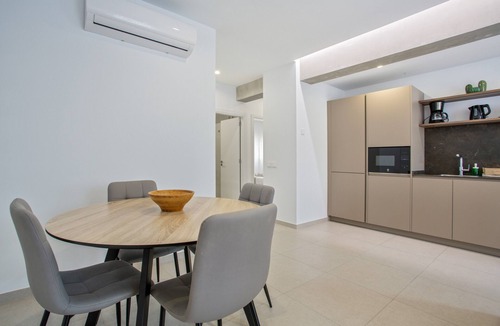 Santa Cruz de Tenerife Apartment | Vacation Apartment 'Obsidian Ático Tajinaste City' with Sea View, Wi-Fi and Air Conditioning