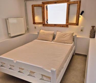 Isthmia Apartment | Vacation Unit - Private Terrace, Steps from Sea