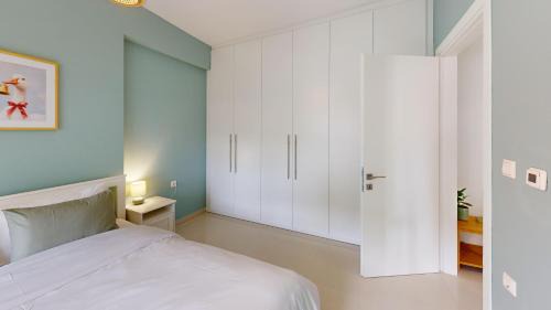 Larissa Apartment | White Mint Apartment