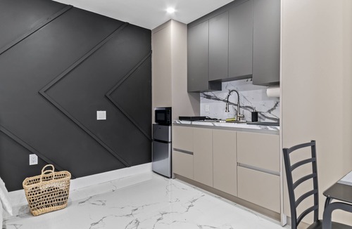 Richmond West Apartment | XL Luxury Room. Luxurious studio retreat with sleek designs.