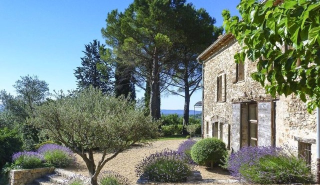 18th century restored stone house in a large mature garden with 360 degree views
