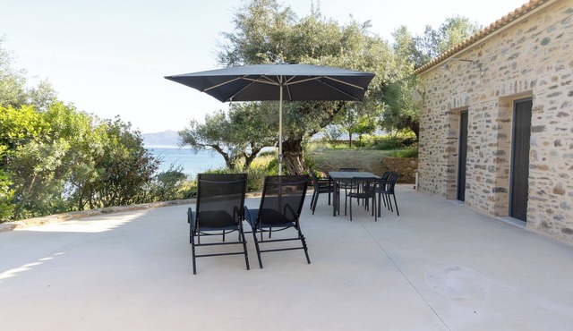 A stone home by the sea for shared slow moments