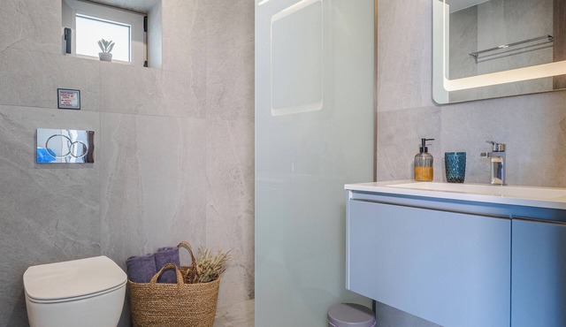 Anatoli (Sunrise), an exquisite seaside villa, with the vibrant hues of sunrise.