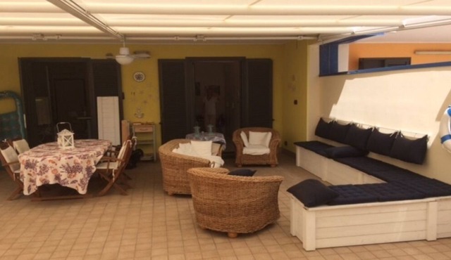 Blue like the sea, ground floor apartment with large terrace.