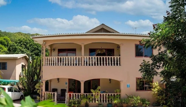 Chez Benoit Self Catering- Au cap, mahe seychelles, beach garden view