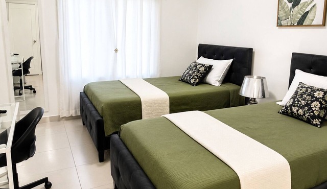first floor apartment in Santiago king side bed pool