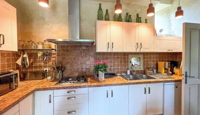 Le Castellas, a historic, renovated home with a pool