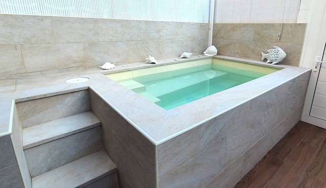 Modern house with fantastic sea views, heated Jacuzzi and WIFI