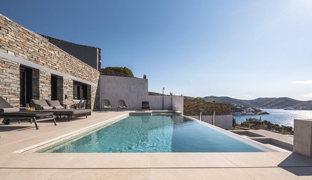 My Rental Homes - Villa Kronos with lounge area and a heated Jacuzzi-plunge pool.