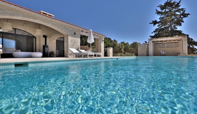 new natural stone villa with large pool and great sea views