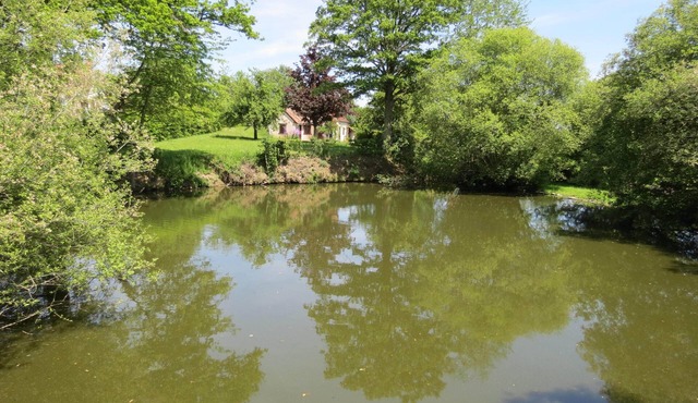Private detached stone house overlooking a lake