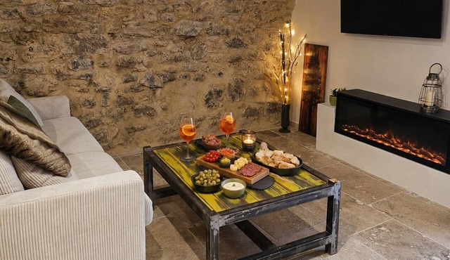 Romantic vacation rental with vaulted stone ceilings