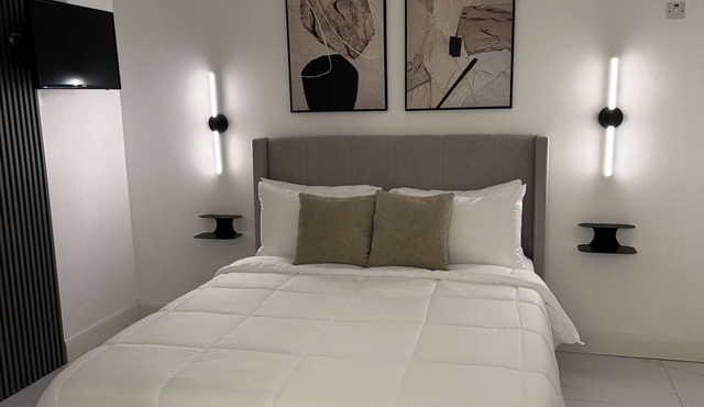 This is an elegantly retrofitted secured ground floor one bedroom apartment.