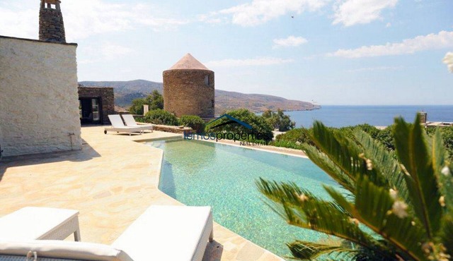 Unique stone villa with a swimming pool and sea view in Koundouros