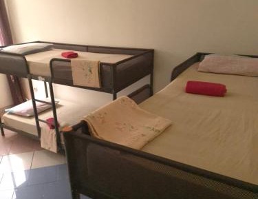 Single Bed in Dormitory Room