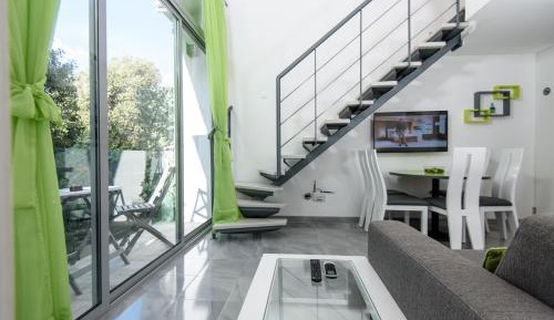 One-Bedroom Duplex Apartment with Terrace and Balcony 