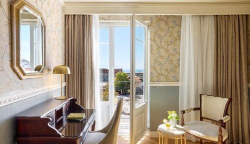 Deluxe Old Port View king bed, marble bathroom and wooden floor