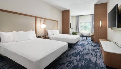 Queen Suite with Two Queen Beds and Sofa Bed